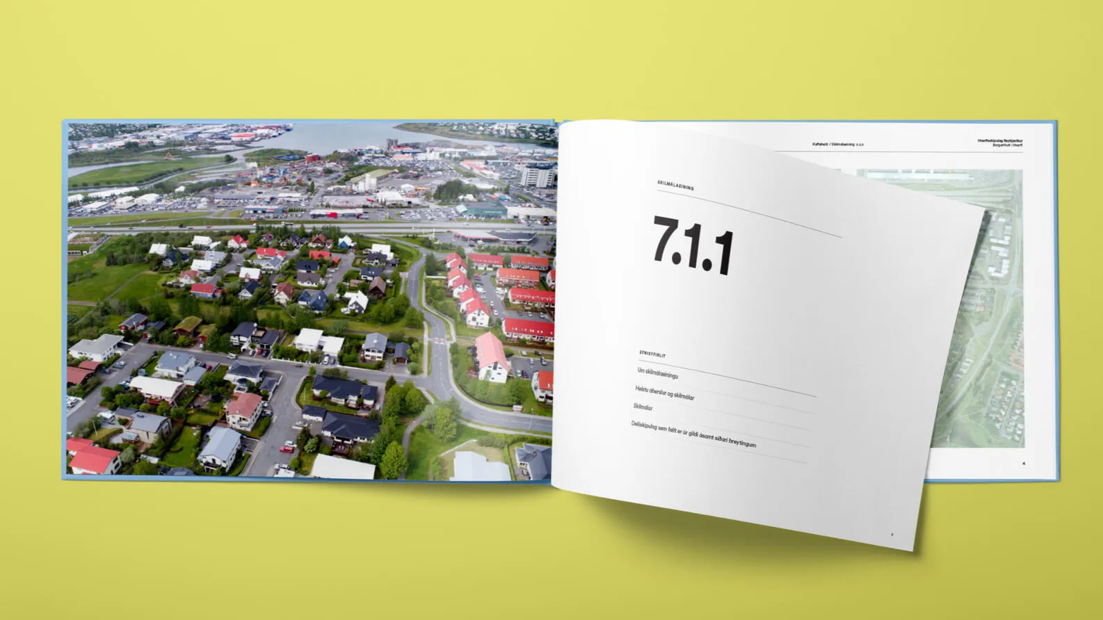 Planning book spread with an aerial photo of a neighbourhood.